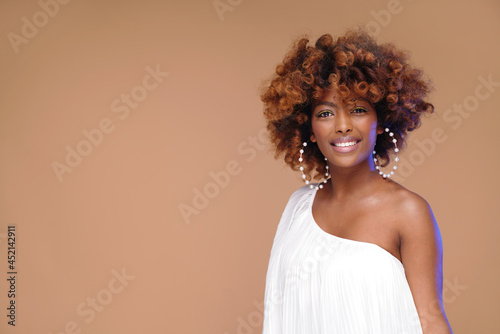 Happy elegant african american woman smiling. Beauty female portrait