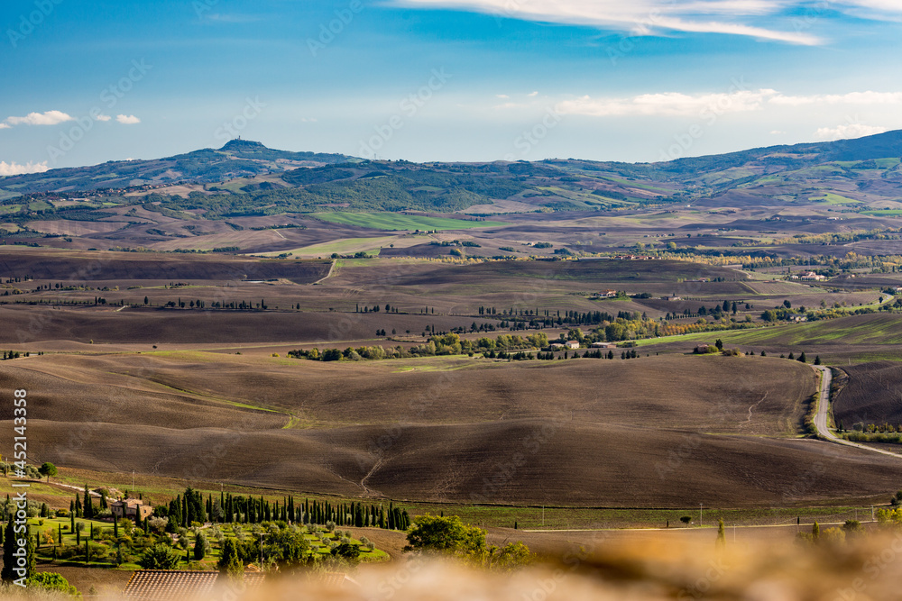 Naklejka premium Tuscany, Italy, elevated view of the autumn fields from the hill town of Pienza