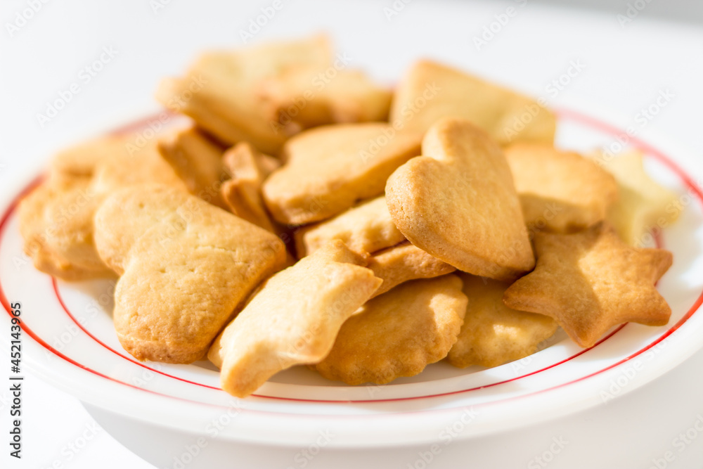 Homemade butter cookies on a dish in beautiful sunlight Homemade butter cookies on a dish in beautiful sunlight