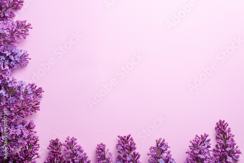 Branches of lilac on pink background. White and purple lilac. Romantic spring mood. Top view. Copy for your text - Image