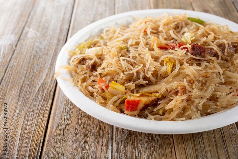 A view of a plate of pancit.