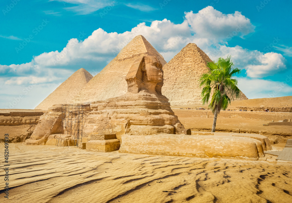 Sphinx and pyramid ruins
