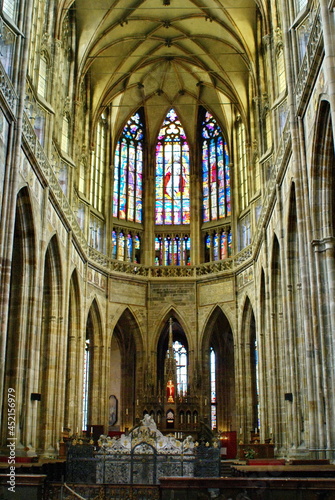 Stained glass window at the end of the main nave in St. Vitus Cathedral in Prague Castle, Prague, Czech Republic