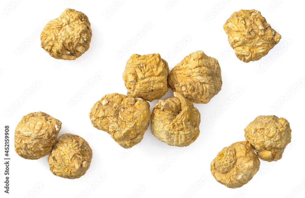 Dried Maca roots isolated on white background, top view Dried Maca roots isolated on white background, top view