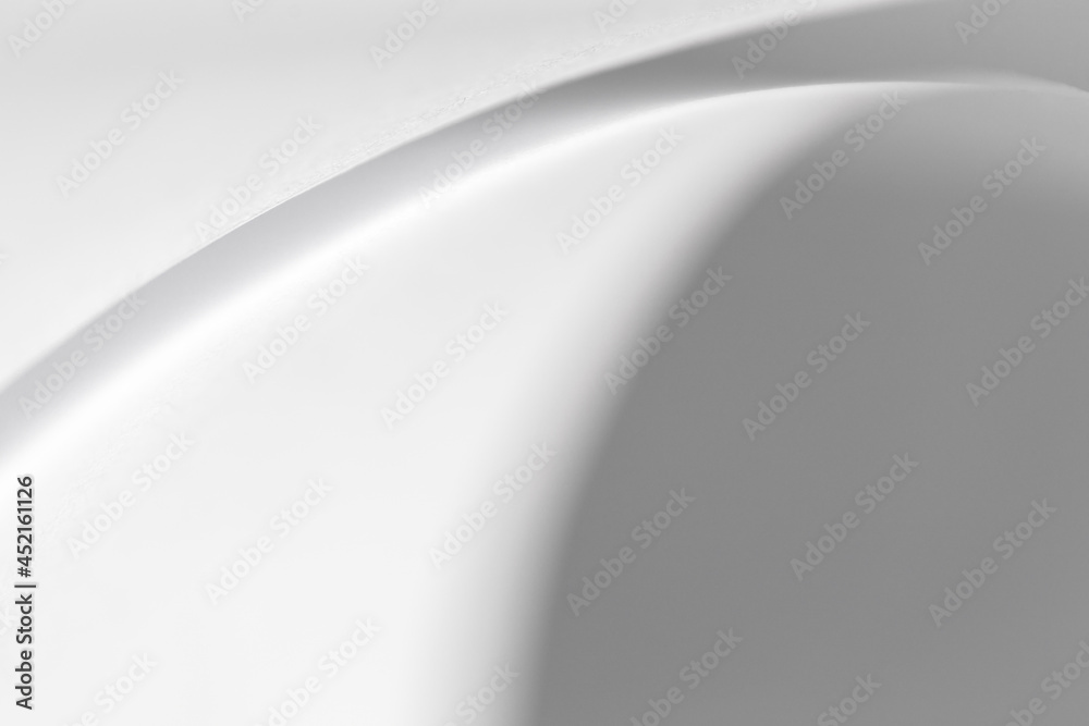 abstract background of curved sheets of paper close-up with a shallow depth of field (blurred) abstract background of curved sheets of paper close-up with a shallow depth of field (blurred)