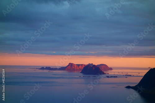 Vaeroya island mountain range during summer sunset in Lofoten, Norway photo