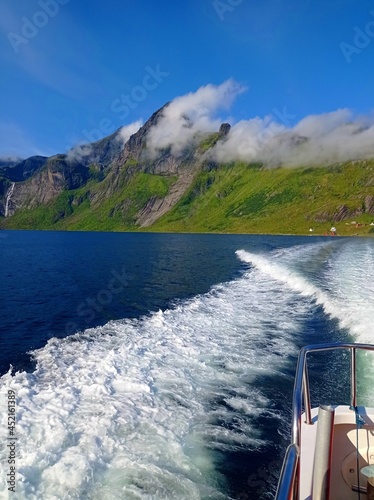 Ferry ride view on Kjerkfjorden, Reinefjorden and Bunesfjorden in Lofoten, Norway photo