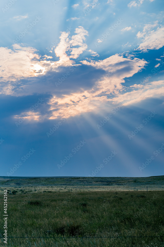 God Rays at Sunset Over Rural Great Plains of Wyoming God Rays at Sunset Over Rural Great Plains of Wyoming