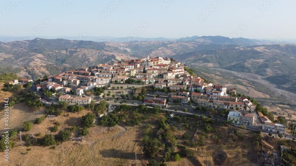 Aerial View of the Town of Castroregio in the South of Italy. Italian Rural Landscape at morning in a sunny day Aerial View of the Town of Castroregio in the South of Italy. Italian Rural Landscape at morning in a sunny day