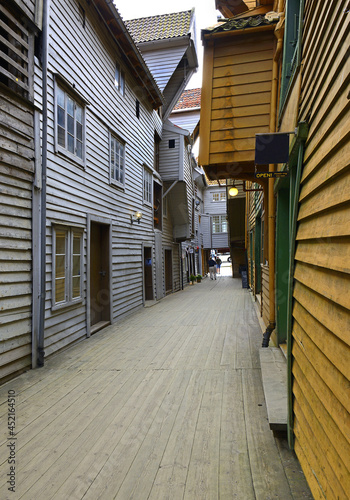 Historic colorful wooden buildings in Bryggen, the Hanseatic quarter dating back to the 14th century and a UNESCO World Heritage Site in central Bergen (Norway) photo