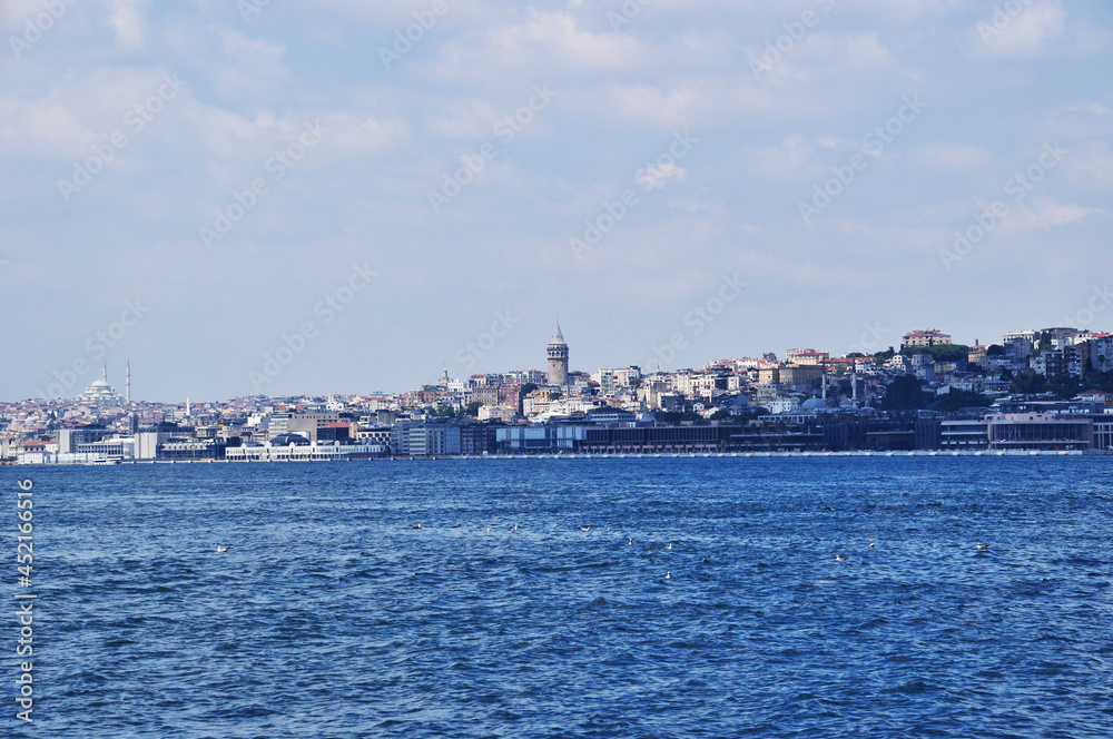 Panorama of the Bosphorus. Coastline and view of the Galata tower. Summer, morning.