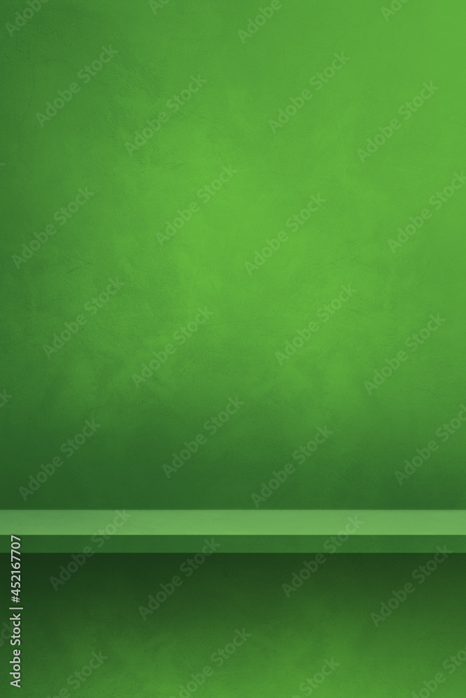 Empty shelf on a green wall. Background template. Vertical backdrop Empty shelf on a green wall. Background template. Vertical backdrop