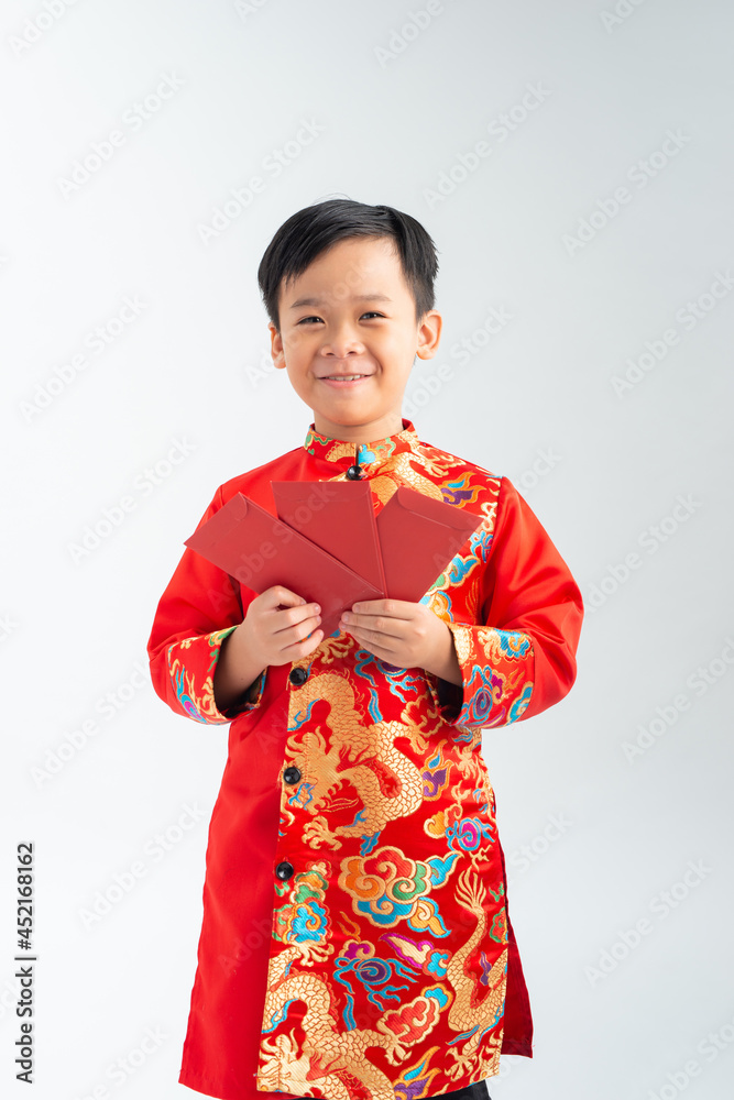 Happy lunar new year. little boy showing red envelope Happy lunar new year. little boy showing red envelope