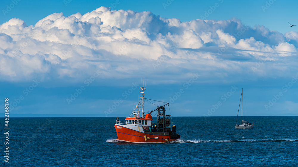 Fototapeta premium Fishing boat in Brixham Marina and Harbour, Torbay, Devon, England