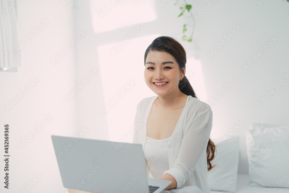 Asian woman use notebook laptop work from home Asian woman use notebook laptop work from home
