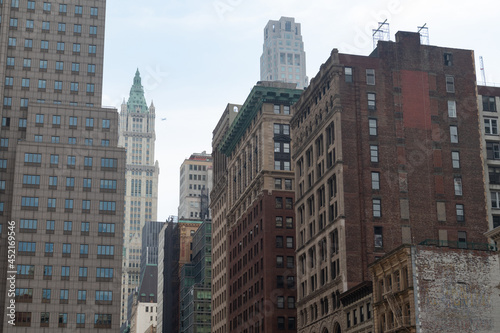 Old Buildings and Skyscrapers along a Street in Lower Manhattan of New York City