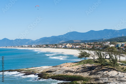 Sunny Day at Saquarema Beach in Rio de Janeiro, Brazil. Famous for waves and surfing. photo