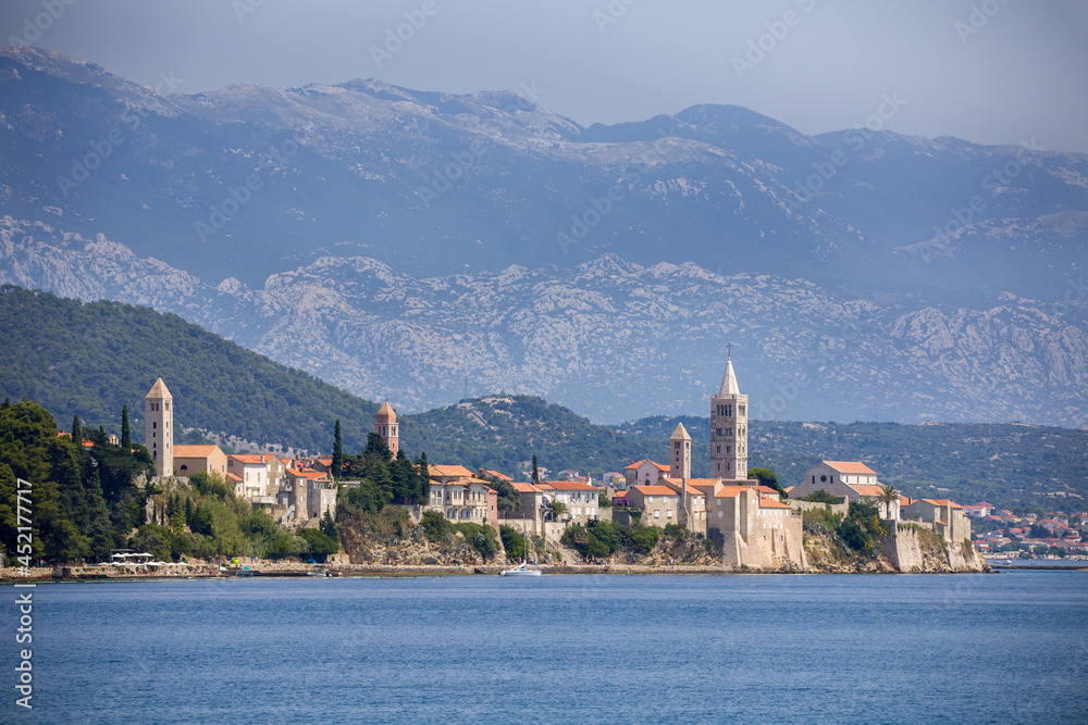 Fototapeta premium the famous church tower of rab view from the adriatic sea