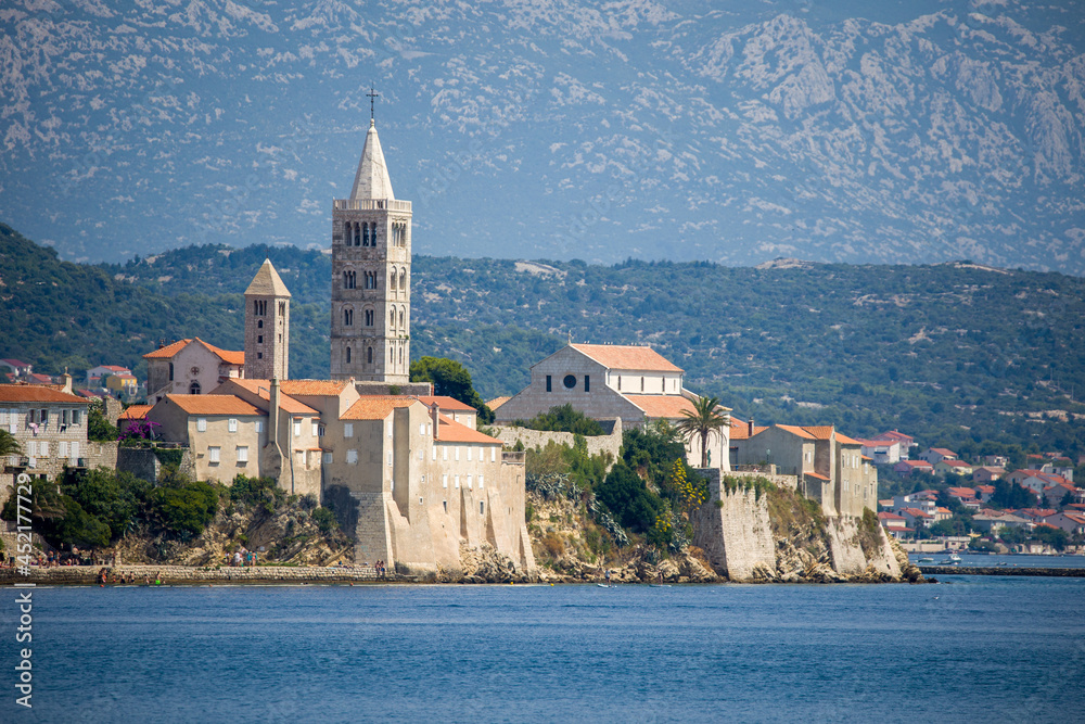the famous church tower of rab view from the adriatic sea