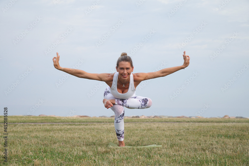 Beautiful young woman doing yoga exercise Beautiful young woman doing yoga exercise