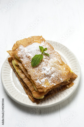 Homemade arabic cake with filo pastry and pastry cream