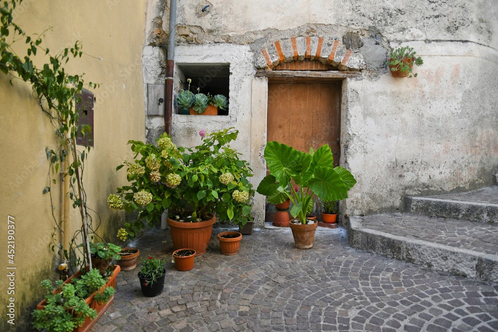 The door of an old house in the historic center of Rivello, a medieval town in the Basilicata region, Italy.