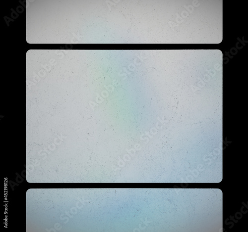 Vintage Super 8 8mm Film Strip Frame Overlay Triple Placeholder with Light Blue Rainbow Light Leaks, Dust and Speckles Texture photo