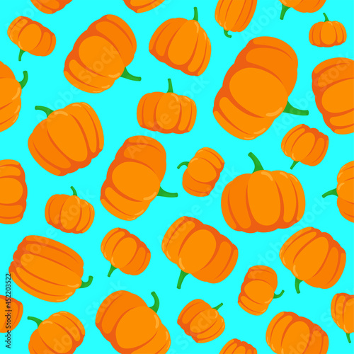 Seamless pattern with hand drawn pumpkins on blue background. Vector eps illustration