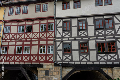 ERFURT, GERMANY, 28 JULY 2020:  The Kramerbrucke, the Merchants' Bridge, continously inhabited for over 500 years photo