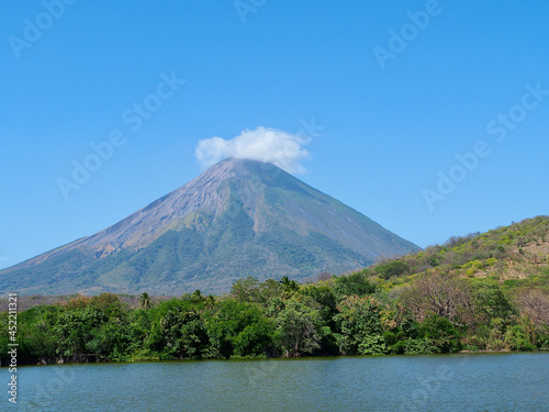 Concepci  n volcano with clouds at Lake Nicaragua