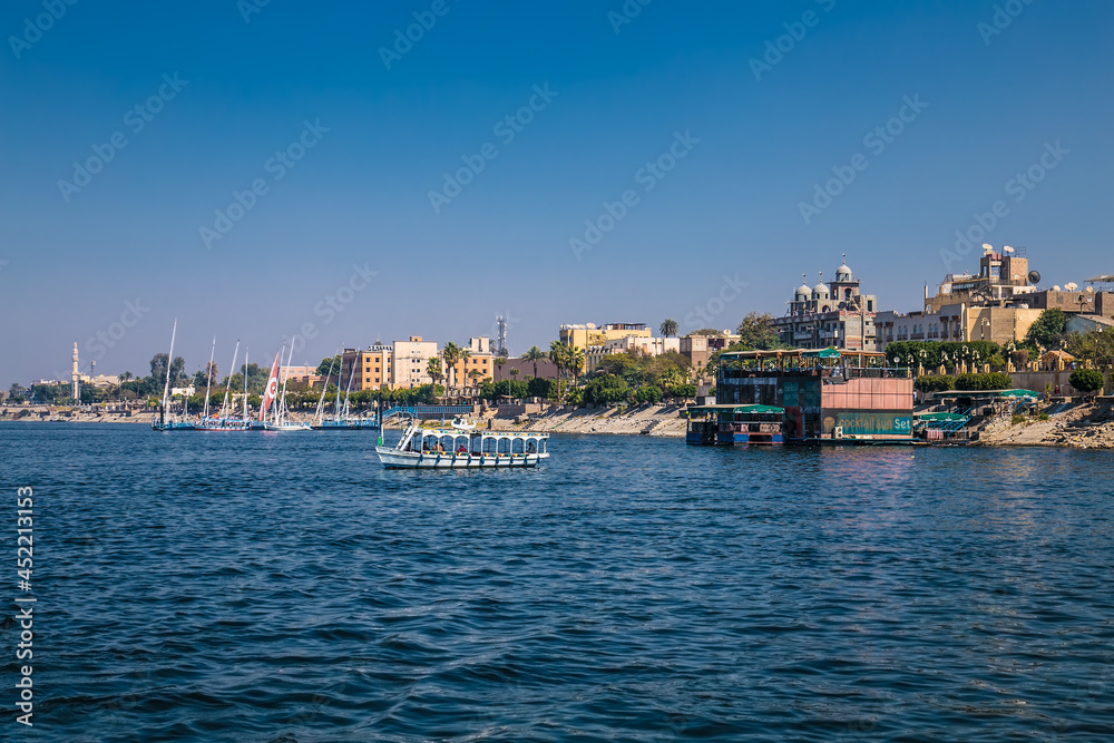 Touristis  boats on the Nile river in Luxor, Egypt