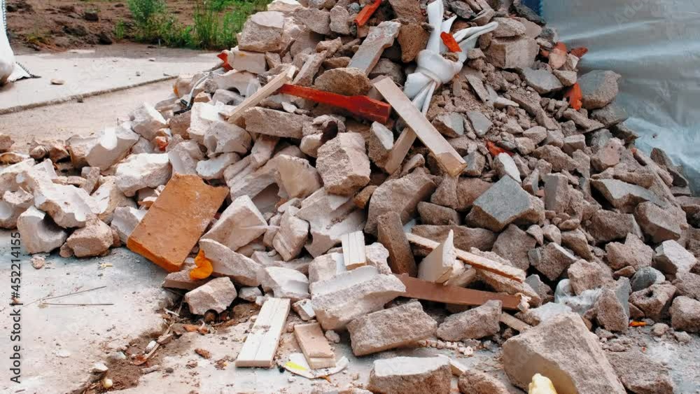 Pile of Cinder Blocks Cement and Various Potentially Hazardous Toxic