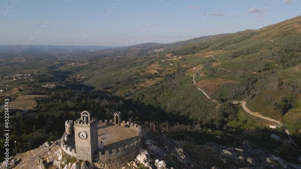Fly over the towers at the Folgosinho Castle in Portugal. Fly over the towers at the Folgosinho Castle in Portugal.