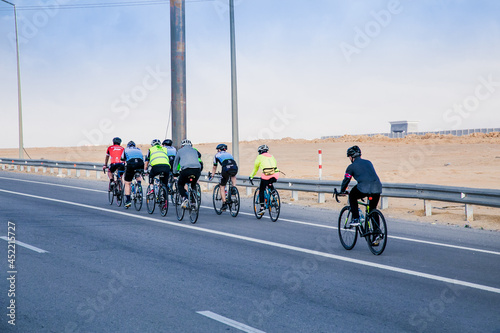 A group of cyclists train on the way to Cairo, Egypt.