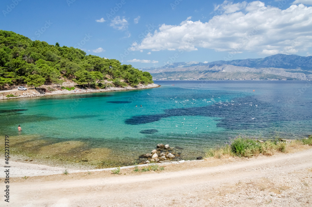 Picturesque beach nearby Postira on the north coast of Brac island in Croatia