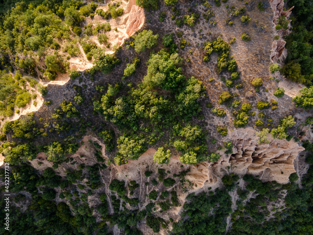 Aerial sunset view of Rozhen sand pyramids, Bulgaria Aerial sunset view of Rozhen sand pyramids, Bulgaria
