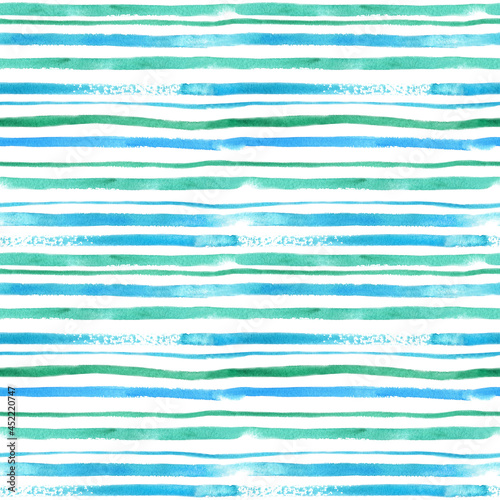 Watercolor stripes of green and blue. Seamless pattern on a white background. Abstract ornament with picturesque lines of different thickness. Creative, decorative, hand drawn print for fabric, paper