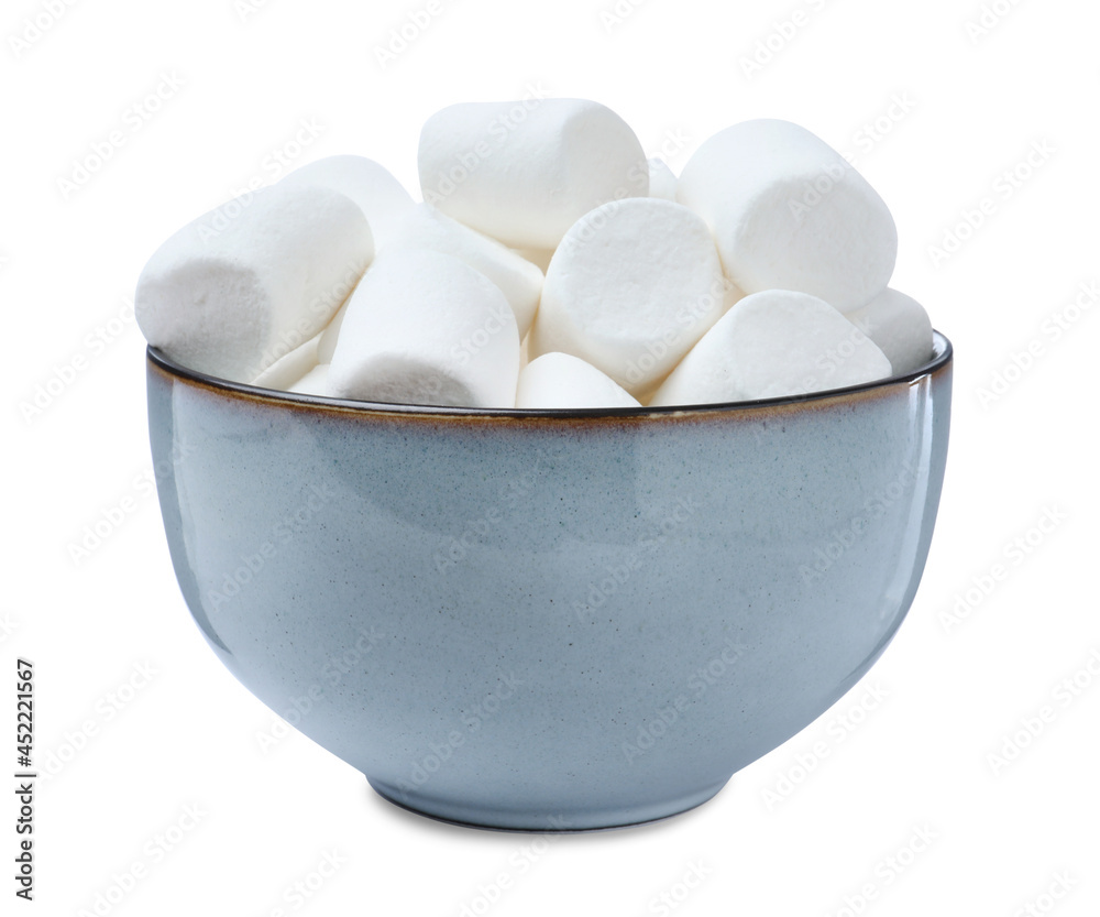 Delicious puffy marshmallows in bowl on white background