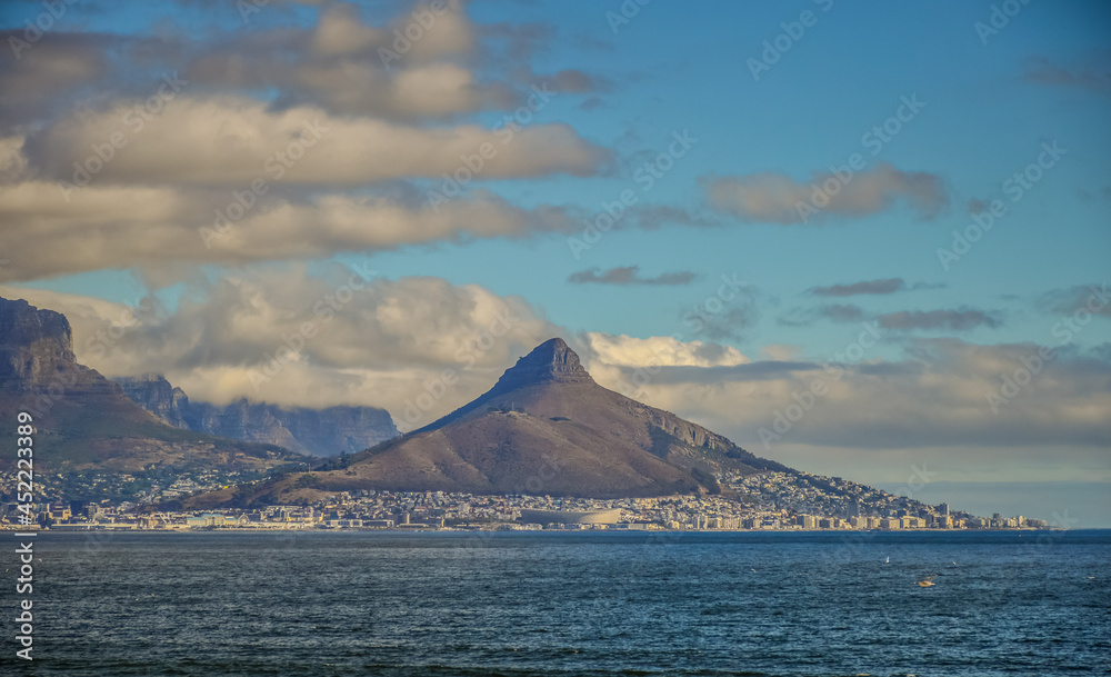 Lion's head , signal hill and table mountain along atlantic ocean in Cape town