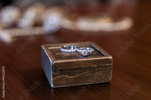 Indian couple's wedding rings close up © Stella Kou