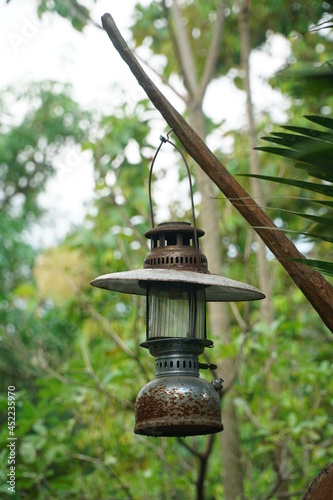 An old Petromax lamp and unused condition in the garden photo