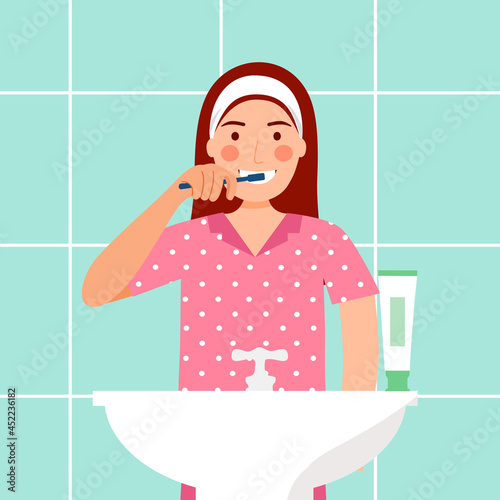 Woman brushing teeth in the bathroom in flat design. Female cleaning teeth to prevent tooth decay. Dental care.