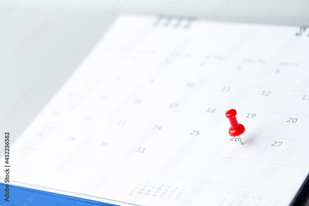 Thumbtack in calendar concept for busy, appointment and meeting reminder, planning for business meeting or travel planning concept. Thumbtack in calendar concept for busy, appointment and meeting reminder, planning for business meeting or travel planning concept.