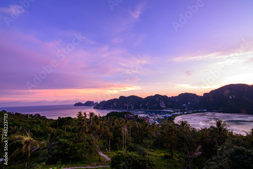 Twilight sunset on Phi Phi Don island view point. Beautiful landscape with tropical sea lagoon.