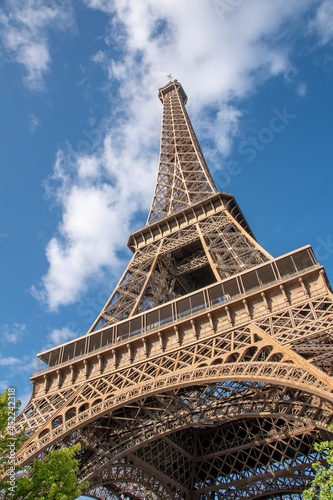 A view from the base of the Eiffel Tower in Paris, france, looking up towards the top on a beautiful sunny day. © John