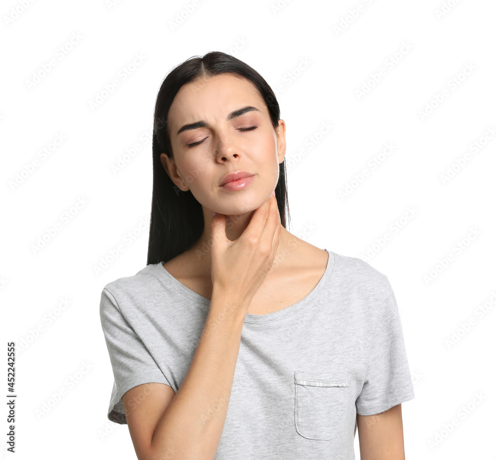 Young woman doing thyroid self examination on white background Young woman doing thyroid self examination on white background