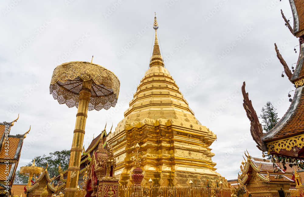 Fototapeta premium Beautiful golden pagoda in wat Phra That Doi Suthep, Chiangmai Thailand
