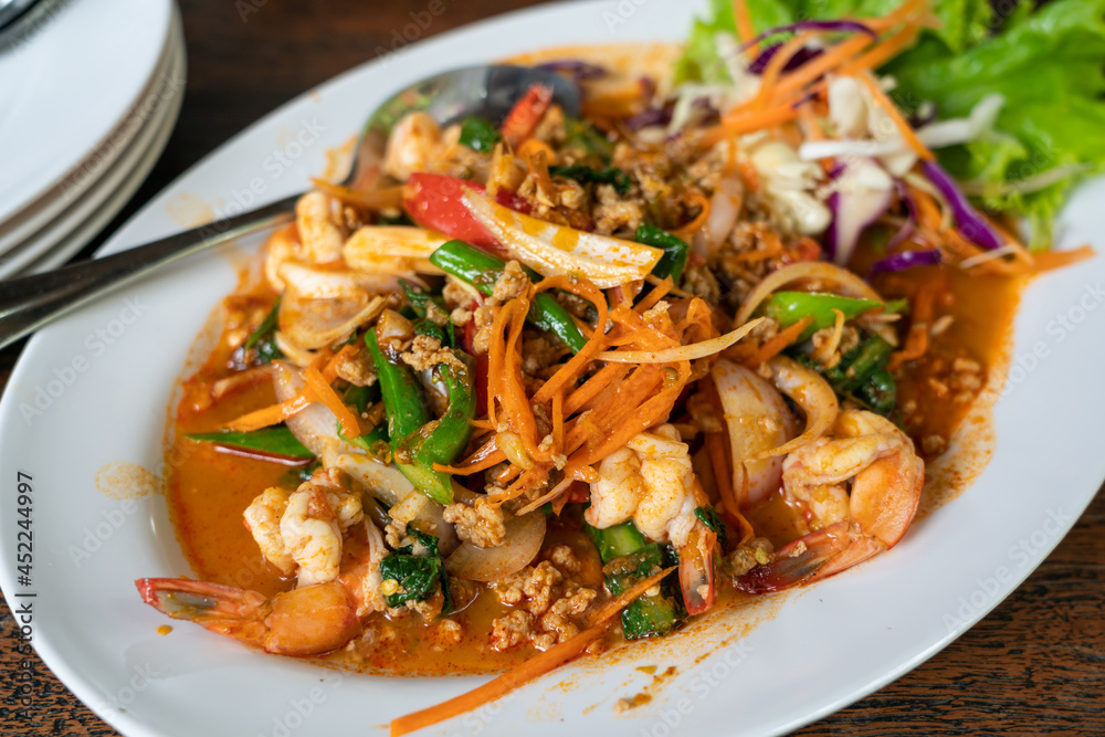 Thai style spicy seafood salad - close up