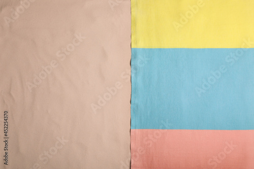Soft beach towel on sand, top view. Space for text. Space for text