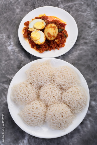 Homemade tasty breakfast- idiyappam with egg roast curry. Kerala food cuisine,